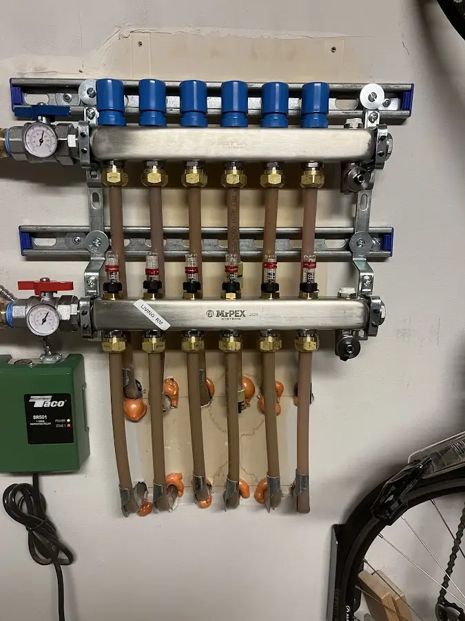 Plumber performing Leak Detection at a residential property in Garden City